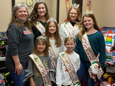 Giving Back: Christmas on the Coosa Queens Set up Collection Boxes with Help from Area Businesses