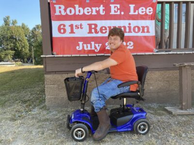 The Spirit of Giving: Jacob Clackley Receives Scooter thanks to Alumni from Robert E. Lee High