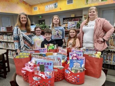 ARIS Library Club Spreads some Love on Valentine’s Day with Assisted Living Residents