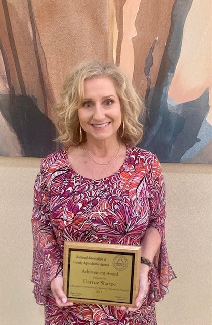 Darrue Sharpe receives Achievement Award from NACAA