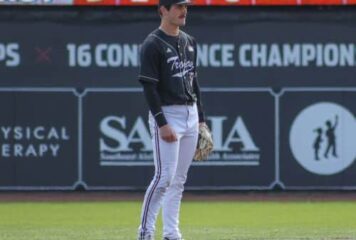 Elmore County native Sean Darnell hits a home run for Troy in College World Series win over Ole Miss